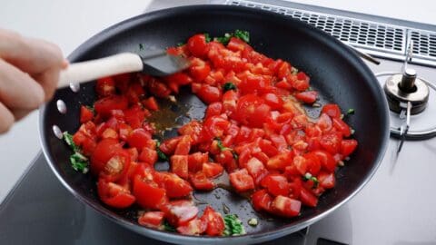 Fresh tomatoes, basil, and garlic for pomodoro sauce.