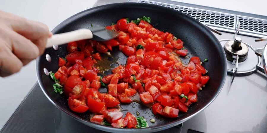 Fresh tomatoes, basil, and garlic for pomodoro sauce.