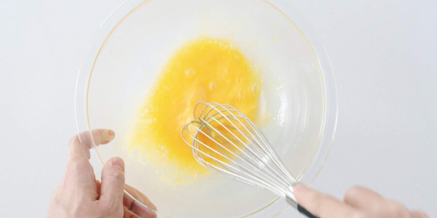 Beating egg for tempura batter.