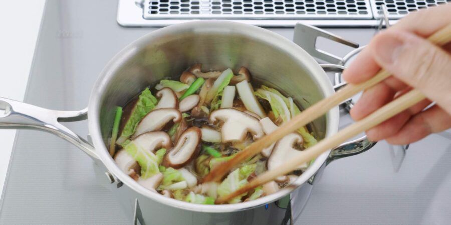 Shiitake mushooms and napa cabbage in dashi stock.