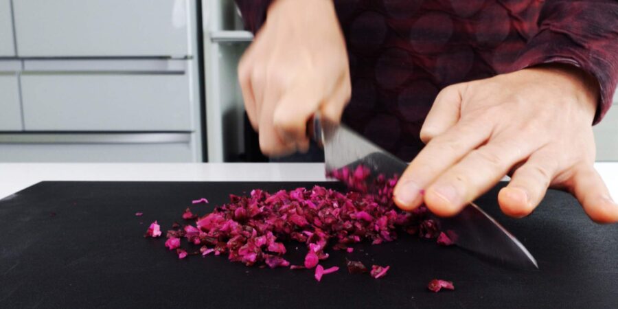Mincing Japanese pickles for oshinko maki.